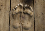 Footprints-carved-in-wood-0